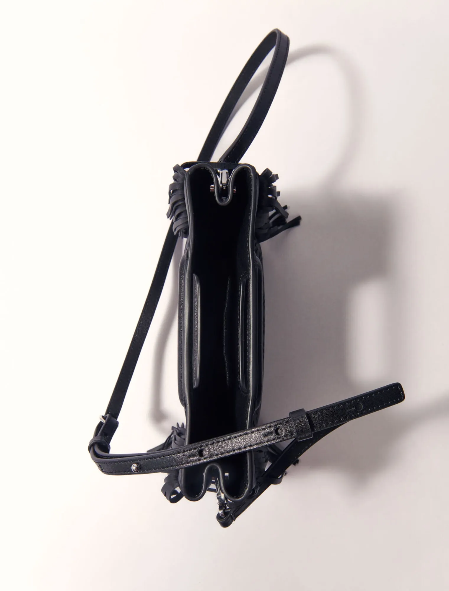Perforated leather m bag