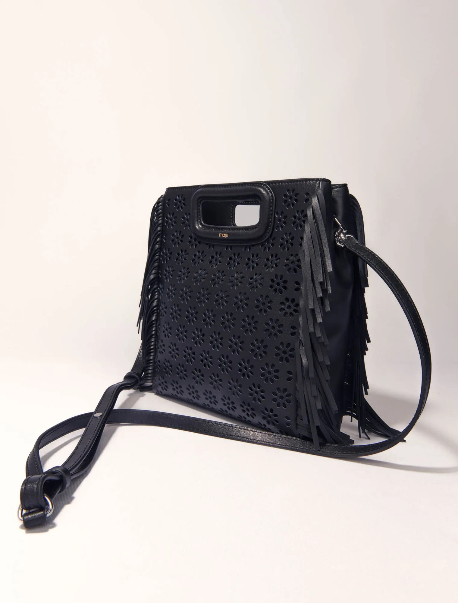 Perforated leather m bag