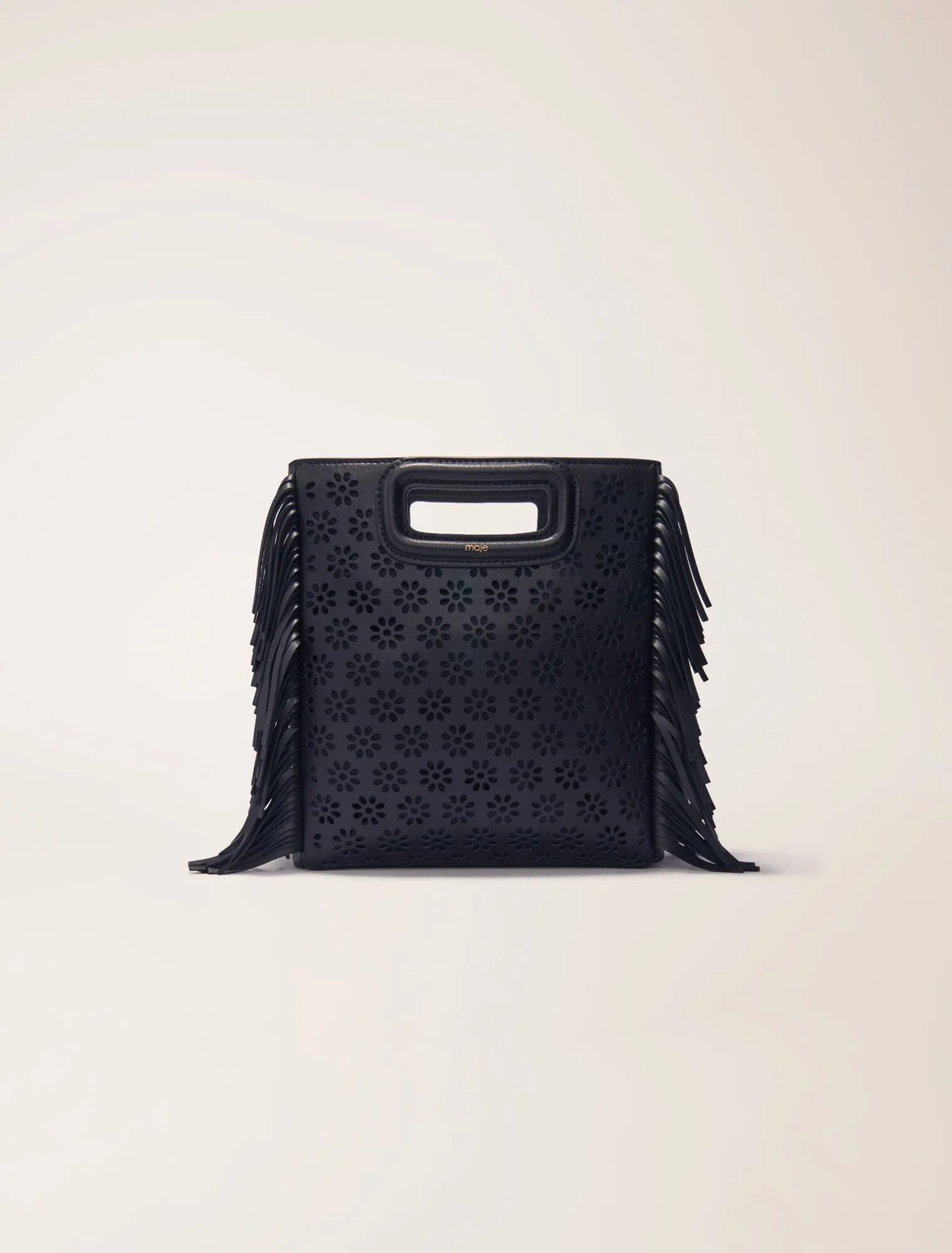 Perforated leather m bag